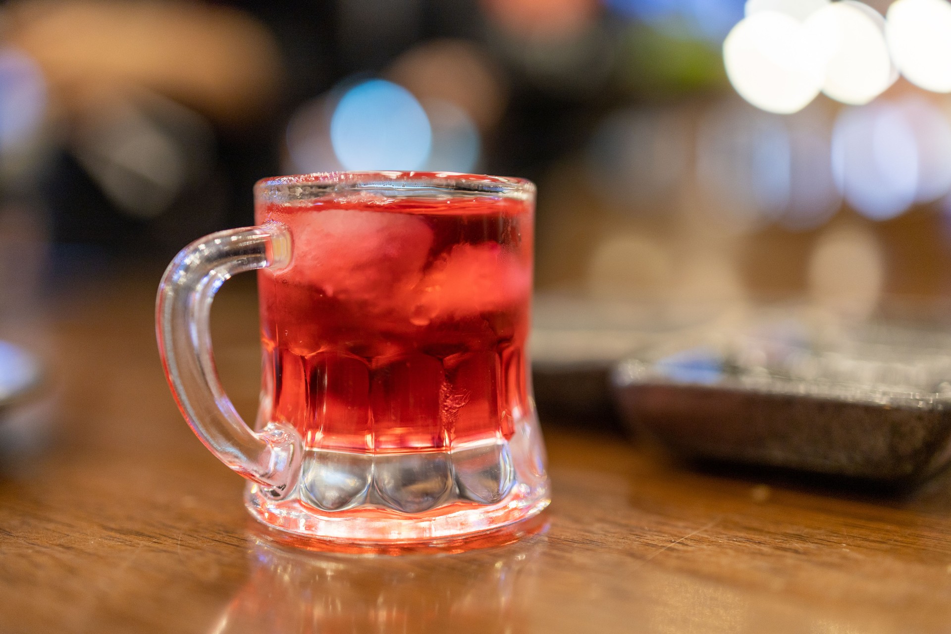 View of Glass of ice red water, sweet water, focus selective